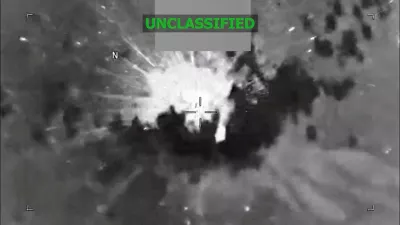 An explosion occurs on a vessel during what the U.S. military says was a kinetic strike on a suspected drug trafficking vessel in the Caribbean, at an unidentified location in this screen grab obtained from a video released on February 13, 2026. US Southern Command/Handout via REUTERS THIS IMAGE HAS BEEN SUPPLIED BY A THIRD PARTY. MANDATORY CREDIT. TEXT OVERLAY AND BLURRING FROM SOURCE.  Verification: Reuters was not able to independently verify the date and location of the footage and identity of the vessel.   TPX IMAGES OF THE DAY
