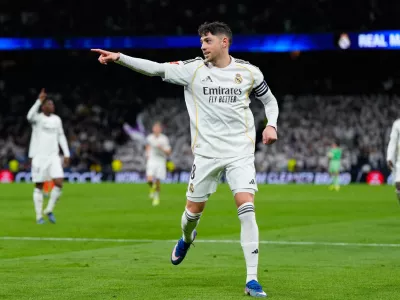 Real Madrid's Federico Valverde celebrates scoring his side's 3rd goal during the Spanish La Liga soccer match between Real Madrid and Real Sociedad in Madrid, Spain, Saturday, Feb. 14, 2026. (AP Photo/Manu Fernandez)