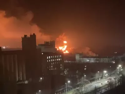 In this photo taken by an anonymous source, smoke and flame are seen from oil storage facilities hit by fire in Bryansk, Russia, Monday, April 25, 2022. The Emergencies Ministry said the massive fire at the depot in the city of Bryansk erupted overnight. The oil depot is owned by Transneft-Druzhba, a subsidiary of the Russian state-controlled company Transneft that operates the western-bound Druzhba (Friendship) pipeline carrying crude to Europe, and it wasn't immediately clear if the blaze could affect the deliveries. (Anonymous source via AP)