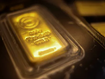 A gold bar marked with the letters "BTC" (out of focus) is displayed at a jewellery shop at the Al Moez Street gold market in Old Cairo as demand for gold bars and coins rises in Egypt, with buyers seeking a safer store of value amid volatile markets and economic uncertainty, traders and industry officials said, in Cairo, Egypt, February 5, 2026. REUTERS/Amr Abdallah Dalsh