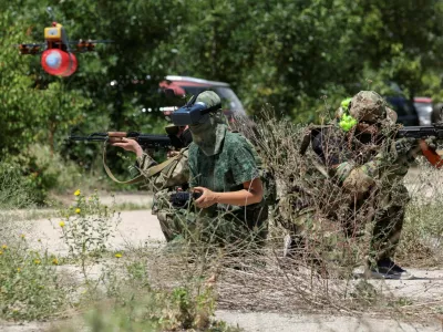 Members of a Russian territorial defence female unit operate FPV drones and practise battle tactics while training at a firing ground near Yevpatoriya, Crimea, July 22, 2023. REUTERS/Alexey Pavlishak