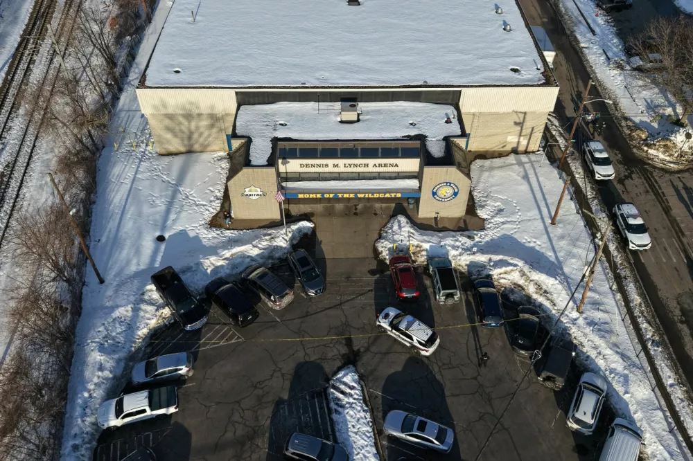 Police and emergency vehicles are seen outside the Dennis M Lynch Arena, an indoor ice skating rink, after a shooting in Pawtucket, Rhode Island, U.S., February 16, 2026, in a drone photograph. REUTERS/CJ Gunther