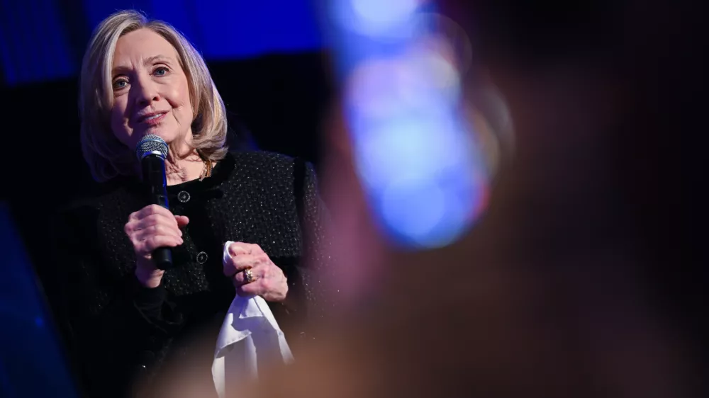 Former U.S. Secretary of State Hillary Clinton speaks at the Cinema for Peace & Democracy gala, in Berlin, Monday, Feb. 16, 2026. (Britta Pedersen/dpa via AP)