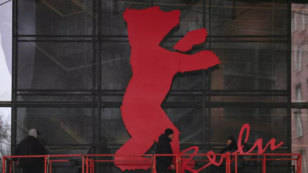 FILE PHOTO: Workers mount the bear logo at the venue entrance of the "Berlinale Palast" for the upcoming Berlinale International Film Festival in Berlin, Germany, February 6, 2026. REUTERS/Liesa Johannssen/File Photo