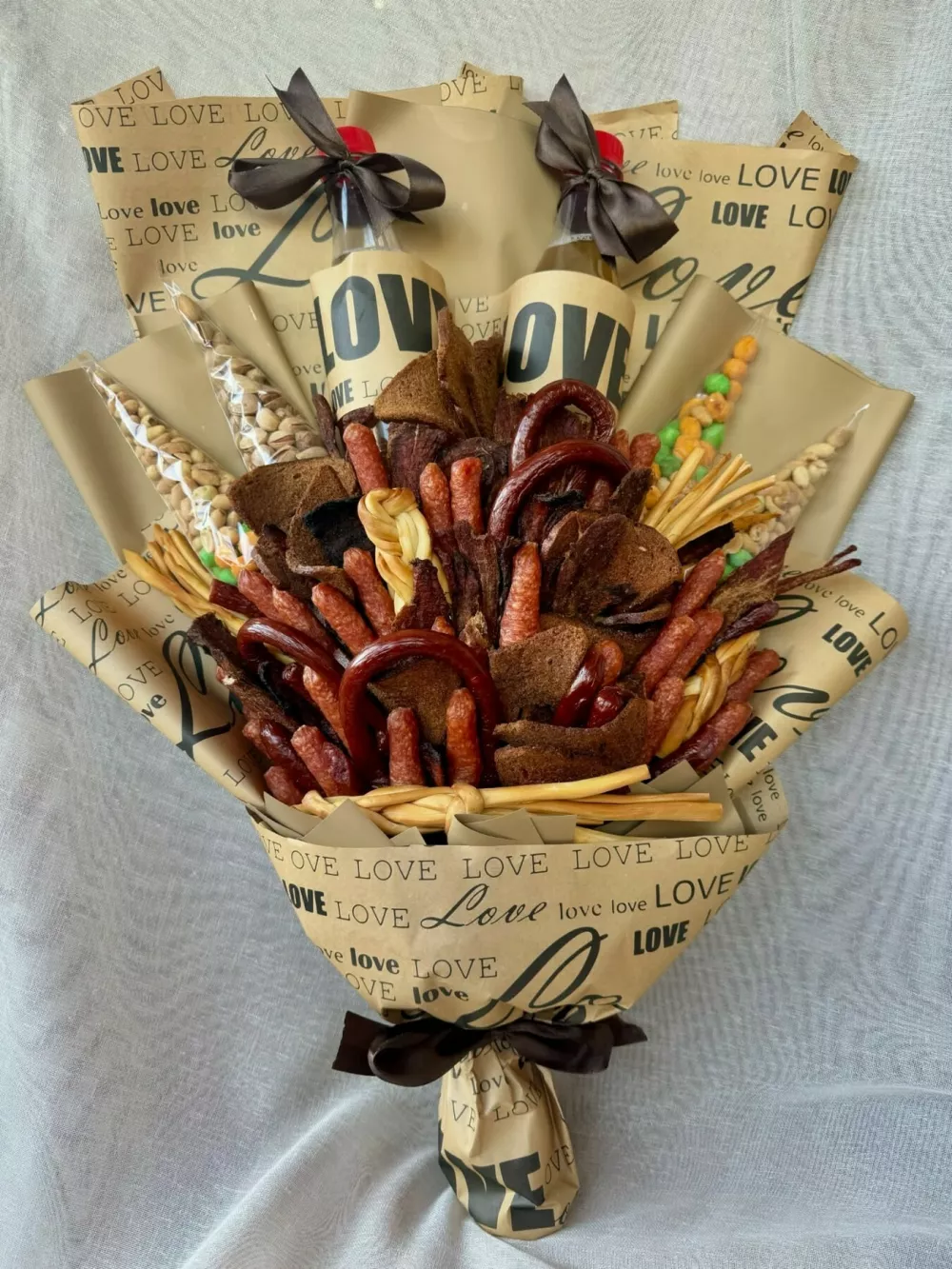 EXCLUSIVE: Story from Jam Press (Bizarre Edible Bouquets)Pictured: A social media user reacts to Katya's bizarre edible bouquets.'I make the world's most bizarre edible BOUQUETS using chicken feet, crisps and seafood'A woman has created what may be the world's most bizarre edible bouquets &ndash; and they come with a very unusual twist.Katya makes eye-catching floral arrangements using unexpected ingredients ranging from chicken feet to crisps and even seafood.The 30-year-old first started making the strange creations after attending a friend's wedding, and the idea quickly took off.One of her clips has gone viral, racking up more than 460,000 likes and over 100,000 comments."After that, I started giving my bouquets as gifts for all holidays to my friends and acquaintances," Katya, who is based in Batumi, Georgia, told What's The Jam."They are unique because each one contains a piece of my love, my signature style and unusual ingredients."Some of her most memorable designs include a bouquet made entirely from chicken feet, while another featured sushi rolls.She has also created arrangements made of crisps, as well as one inspired by burgers and fries.Katya says reactions from those receiving her bouquets range from "surprise, shock, happiness, delight, smiles, and hugs".By day, Katya works as a dentist, but in her spare time, she shares her quirky creations online.In one recent post, she showcased a bouquet made from chicken feet and roses.Social media users were quick to share their thoughts.Riya said: "Awwww it's so beautiful."A second person wrote: "my husband favourite [sic]."A third tagged a friend and added: "we can get each other with this one right, I don't think it's expensive."Tagging a pal, another wrote: "you need that bouquet."A different person wrote: "Wth did I just watched [sic]."Katya says she makes the bouquets as a hobby for her "soul and creativity".She mostly creates them for acquaintances and charges very little, but s.12 Feb 2026Pictured: Story from Jam Press (Bizarre Edible Bouquets)Pictured: One of Katya's bizarre edible bouquets.'I make the world's most bizarre edible BOUQUETS using chicken feet, crisps and seafood'A woman has created what may be the world's most bizarre edible bouquets &ndash; and they come with a very unusual twist.Katya makes eye-catching floral arrangements using unexpected ingredients ranging from chicken feet to crisps and even seafood.The 30-year-old first started making the strange creations after attending a friend's wedding, and the idea quickly took off.One of her clips has gone viral, racking up more than 460,000 likes and over 100,000 comments."After that, I started giving my bouquets as gifts for all holidays to my friends and acquaintances," Katya, who is based in Batumi, Georgia, told What's The Jam."They are unique because each one contains a piece of my love, my signature style and unusual ingredients."Some of her most memorable designs include a bouquet made entirely fr.,Image: 1074267805, License: Rights-managed, Restrictions: NO Australia, Germany, Norway, South Korea, Sweden, United Kingdom, United States, Unknown Country, Model Release: no