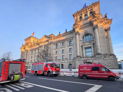 Fire trucks are parked in front of the Reichstag in Berlin, Germany, February 19, 2026. REUTERS/Tobias Schlie
