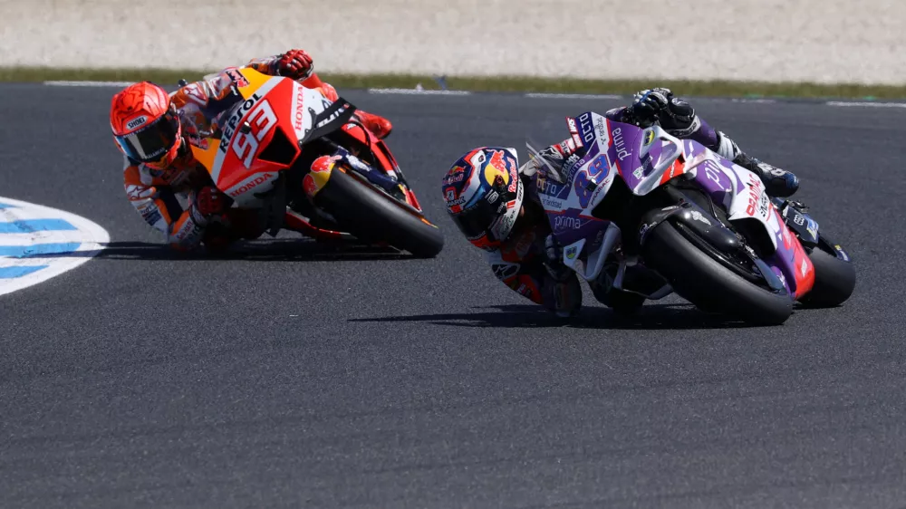 FILE PHOTO: MotoGP - Australian Grand Prix - Phillip Island Grand Prix Circuit, Phillip Island, Australia - October 16, 2022 Pramac Racing's Jorge Martin and Repsol Honda Team's Marc Marquez in action during the MotoGP race REUTERS/Loren Elliott/File Photo