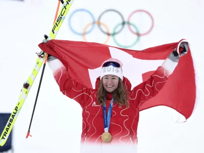 Switzerland's Marianne Fatton celebrates winning a gold medal a ski mountaineering women's final at the 2026 Winter Olympics, in Bormio, Italy, Thursday, Feb. 19, 2026. (AP Photo/Gabriele Facciotti)
