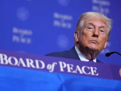 President Donald Trumpl listens during a Board of Peace meeting at the U.S. Institute of Peace, Thursday, Feb. 19, 2026, in Washington. (AP Photo/Mark Schiefelbein)