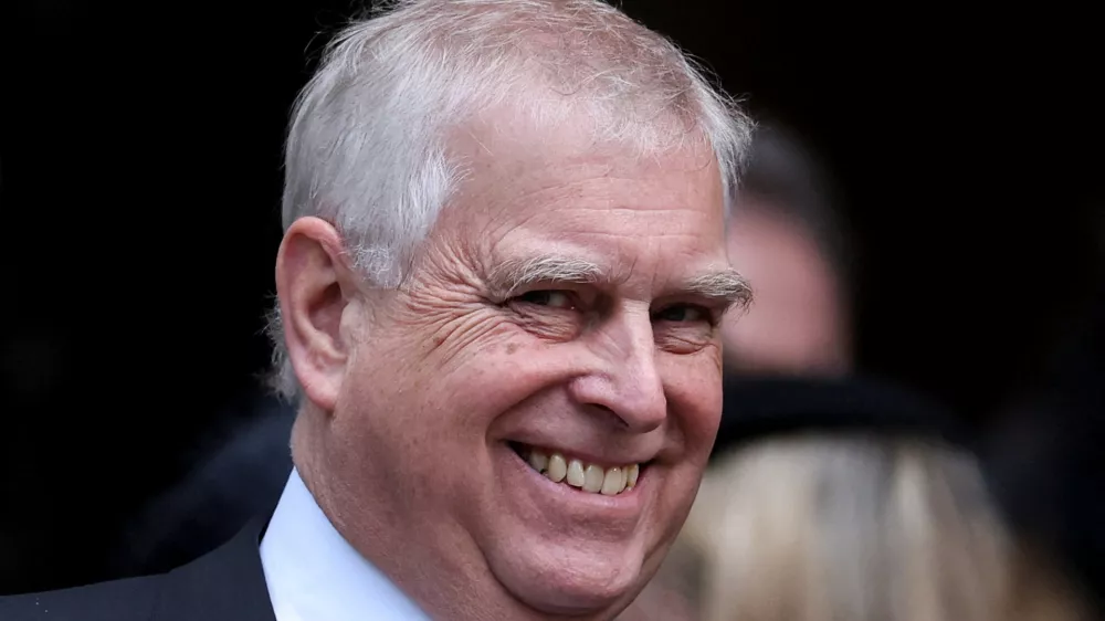 FILE PHOTO: Britain's Prince Andrew reacts at the end of the Requiem Mass, on the day of the funeral of Britain's Katharine, Duchess of Kent, at Westminster Cathedral in London, Britain, September 16, 2025. REUTERS/Toby Melville/File Photo