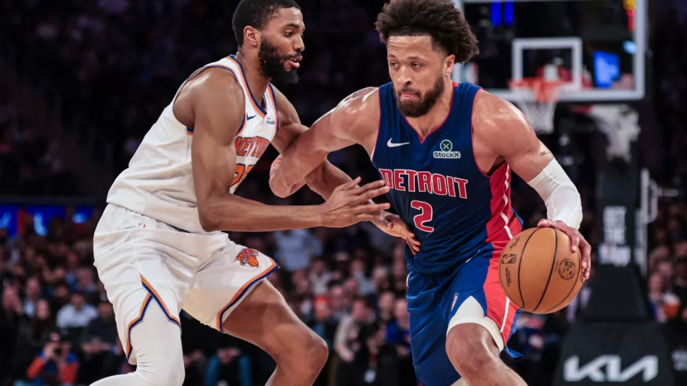 Feb 19, 2026; New York, New York, USA; Detroit Pistons guard Cade Cunningham (2) is guarded by New York Knicks guard Mikal Bridges (25) during the second half at Madison Square Garden. Mandatory Credit: Vincent Carchietta-Imagn Images