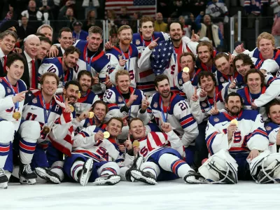 Milano Cortina 2026 Olympics - Ice Hockey - Men's Victory Ceremony - Milano Santagiulia Ice Hockey Arena, Milan, Italy - February 22, 2026. Gold medallists United States celebrate during the victory ceremony REUTERS/Mike Segar