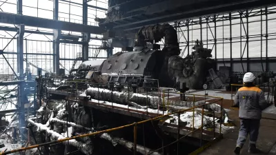 Workers repair the destroyed DTEK company's power plant after a recent Russian missile attack on the country's energy system in an undisclosed location in Ukraine Friday, Jan. 23, 2026. (AP Photo/Mykola Tys)