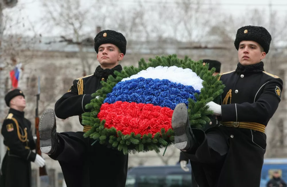 Members of the Russian Navy's Black Sea Fleet guard of honour take part in a ceremony marking Defender of the Fatherland Day in Sevastopol, Crimea, February 23, 2026. REUTERS/Alexey Pavlishak
