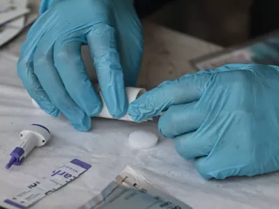 February 21, 2026, Mexico City, Cdmx, Mexico: A member of the ALFA/Inclusive Collective, who is reading this, prepares the material to carry out the tests to detect HIV, Syphilis and HCV in a work area for sex workers on February 21, 2026 in Mexico City. The ALFA/Inclusive Collective is a non-profit organization dedicated to promoting sexual health and providing free rapid HIV, syphilis, and HCV testing. They offer free support to the LGBTQ+ community, transgender sex workers, gay men, and anyone who needs it. They offer this service monthly in various parts of the city. This time, they conducted testing outside the San Fernando Cemetery, which is part of a sex work corridor that includes Alameda Central, Puente de Alvarado, Zona Rosa, Sullivan, and other areas of the city known for easy access to this profession, considered the oldest in the world. The ALFA/Inclusive Collective, which has been in existence for about three years, is comprised of Rogelio J. Gomez Rivera (General Director), Jannu Lira Alatorre (Operations Director), and a professional, specialized, and trained team that conducts these tests, provides follow-up, and offers support in case of positive or reactive test results. (Credit Image: &copy; Josue P&Atilde;&copy;Rez/Nexpher Images via ZUMA Press Wire)