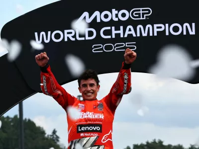 MotoGP - Japanese Grand Prix - Mobility Resort Motegi, Motegi, Japan - September 28, 2025 Ducati Lenovo Team's Marc Marquez celebrates on the podium after winning the 2025 MotoGP World Championship REUTERS/Kim Kyung-Hoon