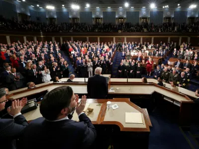 Members of the Congress give a standing ovation as U.S. President Donald Trump delivers the State of the Union address in the House Chamber of the U.S. Capitol in Washington, D.C., U.S., February 24, 2026. REUTERS/Jessica Koscielniak/Pool