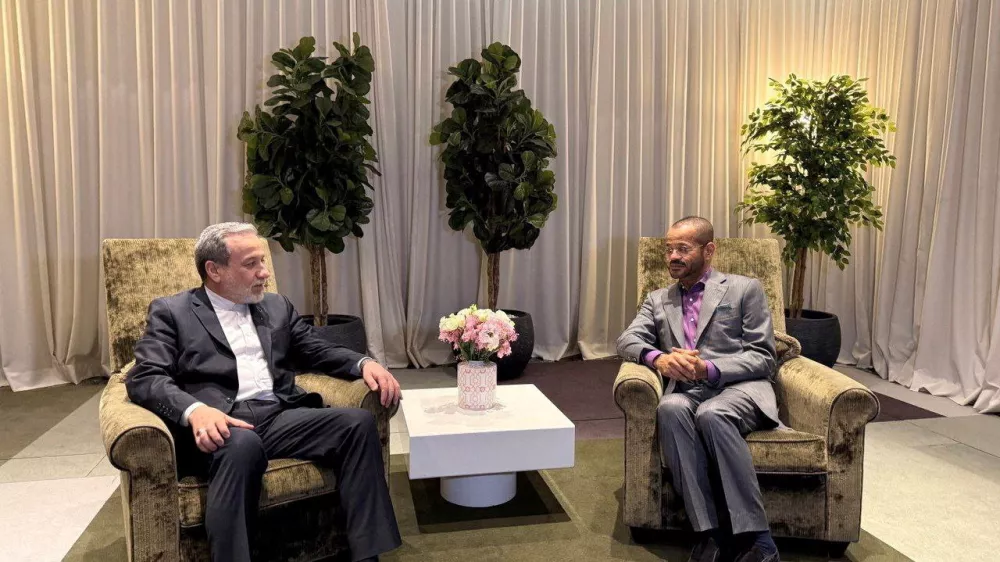 Iranian Foreign Minister Abbas Araqchi meets with Omani Foreign Minister Sayyid Badr Albusaidi in Geneva, Switzerland, February 25, 2026. Iranian Foreign Ministry/WANA (West Asia News Agency)/ Handout via REUTERS ATTENTION EDITORS - THIS PICTURE WAS PROVIDED BY A THIRD PARTY.   TPX IMAGES OF THE DAY