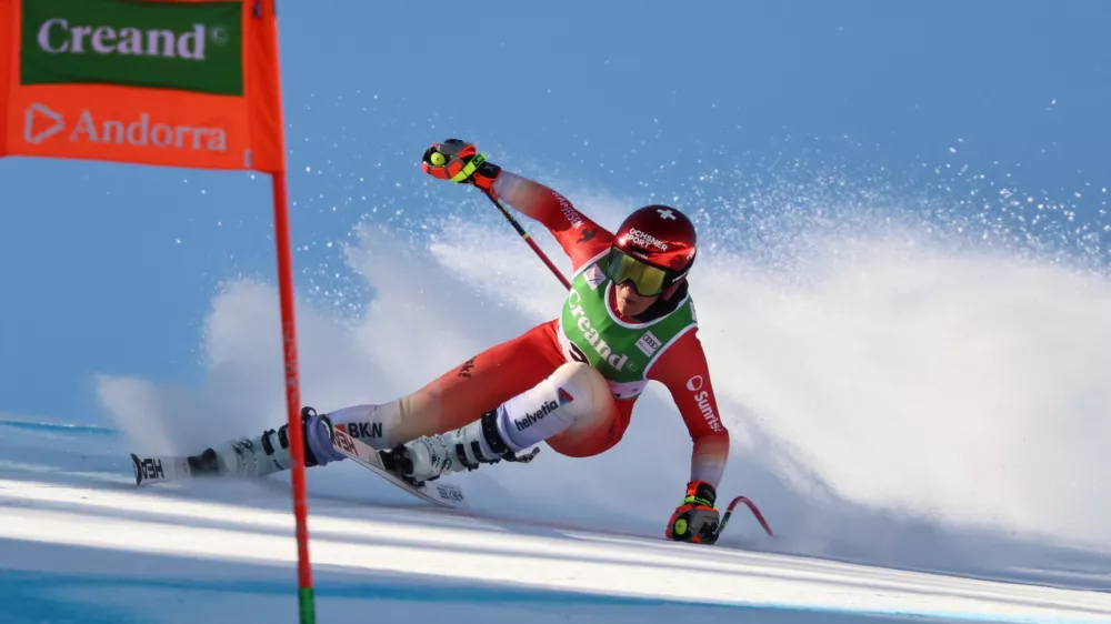 Switzerland's Corinne Suter speeds down the course during an alpine ski, women's World Cup downhill training, in Soldeu, Andorra, Thursday, February. 26, 2026. (AP Photo/Marco Trovati)