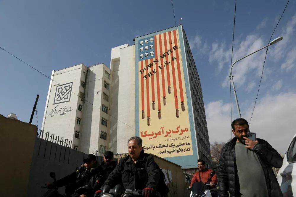A graffiti on a wall reads" Down with the U.S.A", after Israel said it launched a pre-emptive attack against Iran, in Tehran, Iran, February 28, 2026. Majid Asgaripour/WANA (West Asia News Agency) via REUTERS ATTENTION EDITORS - THIS PICTURE WAS PROVIDED BY A THIRD PARTY