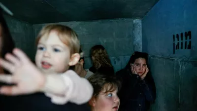 People take shelter, after missiles were launched from Iran towards Israel, following Israel and U.S. strikes on Iran, in Ashkelon, Israel, February 28, 2026. REUTERS/Amir Cohen   TPX IMAGES OF THE DAY