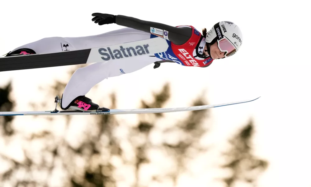 FILE - Nika Prevc, of Slovenia, soars through the air during her first round jump of the ski jumping women's large hill individual competition at the Nordic World Ski Championships in Trondheim, Norway, March 7, 2025. (AP Photo/Matthias Schrader, File)