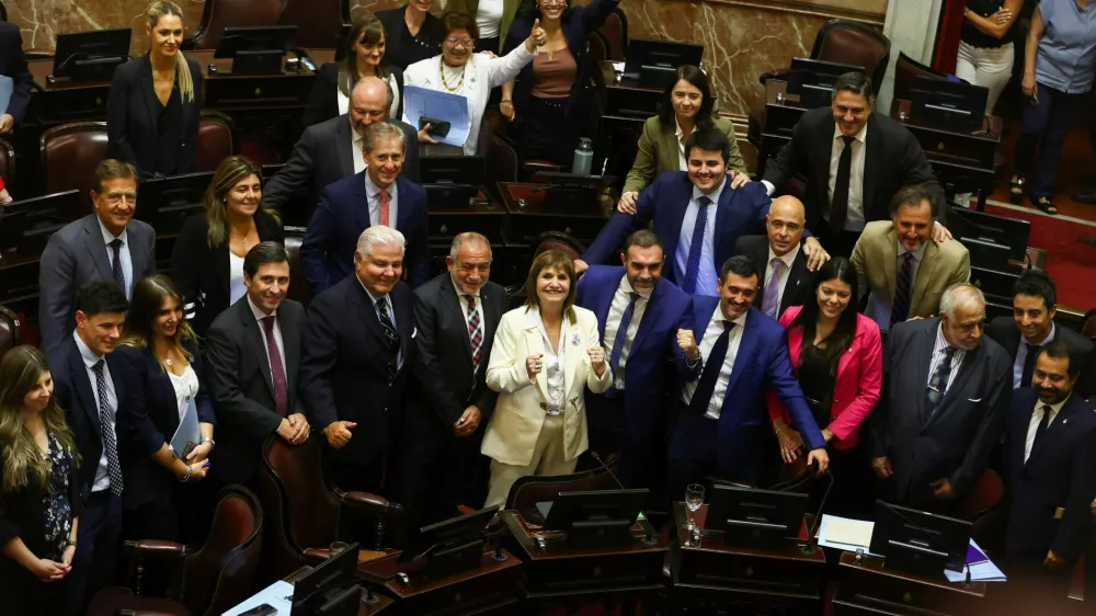 Senator Patricia Bullrich celebrates with other senators, as the senate passes the labor reform law proposed by President Javier Milei's libertarian government to attract investment and revive growth, and which unions say will roll back workers' rights, in Buenos Aires, Argentina February 27, 2026. REUTERS/Matias Baglietto