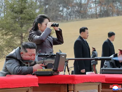 North Korean leader Kim Jong Un sits as he meets with leading officials and military commanders, accompanied by his daughter Kim Ju Ae, in Pyongyang, North Korea, in this picture released on February 28, 2026, by North Korea's official Korean Central News Agency. KCNA via REUTERS  ATTENTION EDITORS - THIS IMAGE WAS PROVIDED BY A THIRD PARTY. REUTERS IS UNABLE TO INDEPENDENTLY VERIFY THIS IMAGE. NO THIRD PARTY SALES. SOUTH KOREA OUT. NO COMMERCIAL OR EDITORIAL SALES IN SOUTH KOREA.   TPX IMAGES OF THE DAY