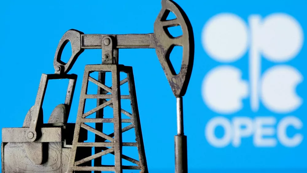 FILE PHOTO: A 3D printed oil pump jack is seen in front of displayed Opec logo in this illustration picture, April 14, 2020. REUTERS/Dado Ruvic/Illustration/File Photo
