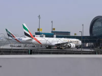 Planes are parked at Terminal 3 of the Dubai International Airport, following the United States and Israel strikes on Iran, in Dubai, United Arab Emirates, March 2, 2026. REUTERS/Raghed Waked