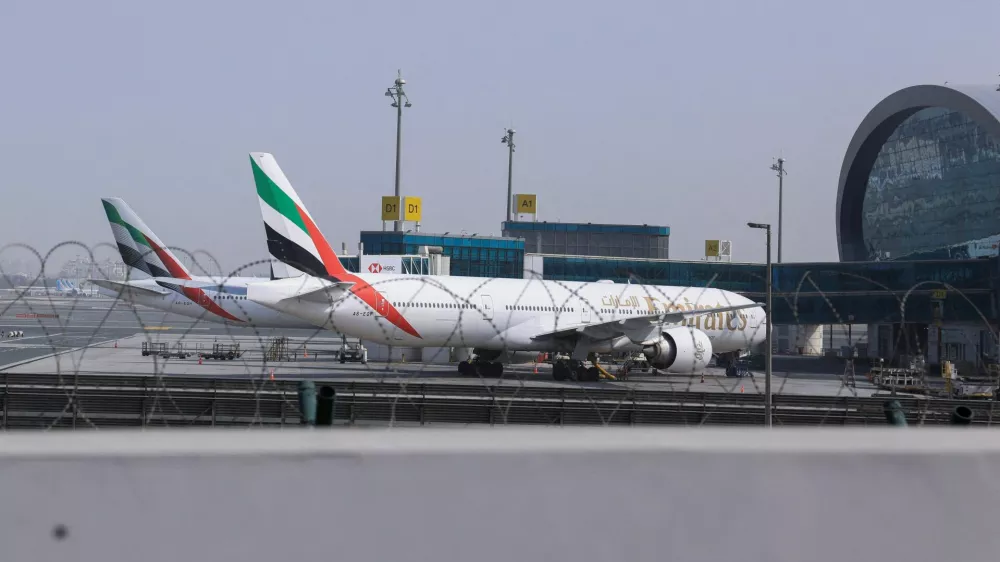 Planes are parked at Terminal 3 of the Dubai International Airport, following the United States and Israel strikes on Iran, in Dubai, United Arab Emirates, March 2, 2026. REUTERS/Raghed Waked