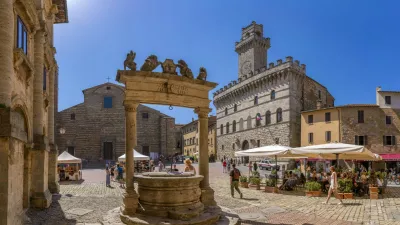 View of well and Palazzo Comunale in Piazza Grande in Montepulciano, Montepulciano, Province of Siena, Tuscany, Italy, Europe Copyright: FrankxFell 844-31293,Image: 829598959, License: Rights-managed, Restrictions: imago is entitled to issue a simple usage license at the time of provision. Personality and trademark rights as well as copyright laws regarding art-works shown must be observed. Commercial use at your own risk., Model Release: no