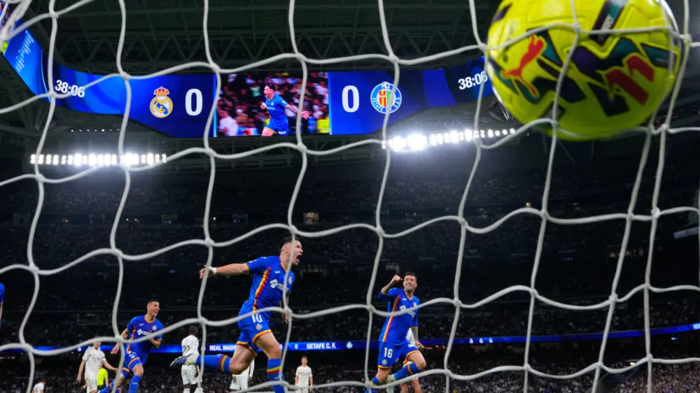Getafe's Satriano celebrates the opening goal during a Spanish La Liga soccer match between Real Madrid and Getafe in Madrid, Spain, Monday, March 2, 2026. (AP Photo/Manu Fernandez)