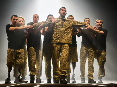 FILE - Ukrainian war veterans, many of whom sustained severe injuries in combat during Russia's full-scale invasion of Ukraine, perform during a theater premiere in in Kyiv, Feb. 19, 2026. (AP Photo/Efrem Lukatsky, File)