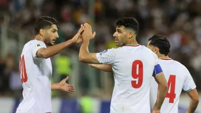 FILE PHOTO: Soccer Football - World Cup - Asian Qualifiers - Group A - Iran v North Korea - Azadi Stadium, Tehran, Iran - June 10, 2025 Iran's Mehdi Taremi celebrates scoring their second goal with Mohammad Mohebi Majid Asgaripour/WANA (West Asia News Agency) via REUTERS  ATTENTION EDITORS - THIS IMAGE HAS BEEN SUPPLIED BY A THIRD PARTY./File Photo