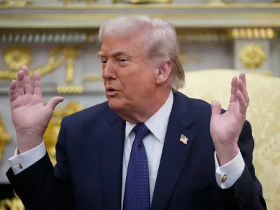 President Donald Trump speaks during a meeting with German Chancellor Friedrich Merz in the Oval Office at the White House, Tuesday, March 3, 2026, in Washington. (AP Photo/Mark Schiefelbein)