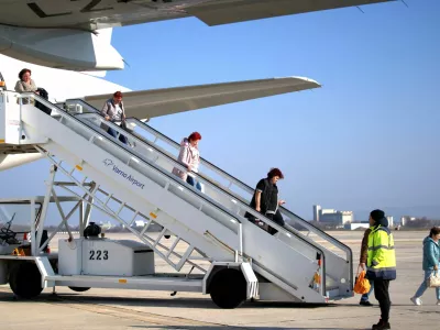 FILE PHOTO: People who were stranded in Dubai amid the U.S.-Israeli conflict with Iran, arrive at Varna Airport, in Varna, Bulgaria, March 4, 2026. REUTERS/Orlin Tsanev/File Photo