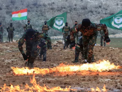 FILE PHOTO: Iranian Kurdish fighters from the Kurdistan Freedom Party (PAK) take part in a training session at a base on the outskirts of Erbil, Iraq February 12, 2026. REUTERS/Thaier Al-Sudani/File Photo