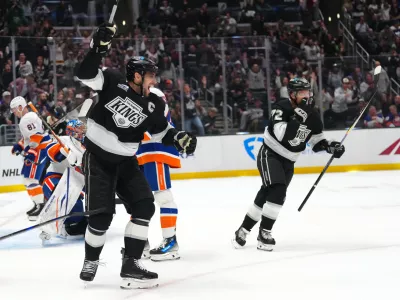 Mar 5, 2026; Los Angeles, California, USA; LA Kings center Anze Kopitar (11) and left wing Artemi Panarin (72) celebrate after a goal against the New York Islanders in the second period at Crypto.com Arena. Mandatory Credit: Kirby Lee-Imagn Images