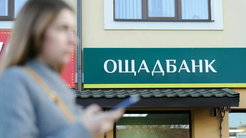 November 3, 2021, Lviv, Ukraine: Logo of Oschadbank or State Savings Bank of Ukraine is seen at one of their branches.,Image: 641461280, License: Rights-managed, Restrictions:, Model Release: no