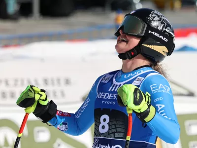 Italy's Laura Pirovano celebrates at the finish area of an alpine ski, women's World Cup downhill, in Val di Fassa, Italy, Friday, February. 27, 2026. (AP Photo/Marco Trovati)