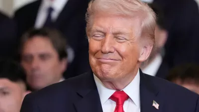 President Donald Trump smiles as he listens during an event to honor the 2025 Major League Soccer champions Inter Miami CF in the East Room of the White House, Thursday, March 5, 2026, in Washington. (AP Photo/Alex Brandon)