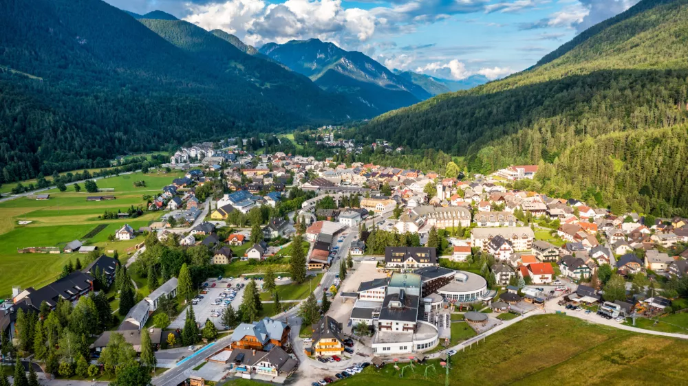 Kranjska Gora town in Slovenia at summer with beautiful nature and mountains in the background. View of mountain landscape next to Kranjska Gora in Slovenia, view from the top the town Kranjska Gora.