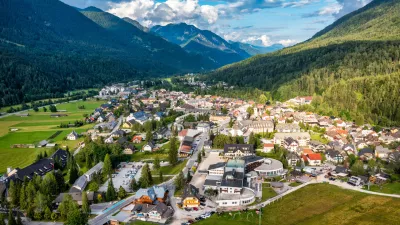 Kranjska Gora town in Slovenia at summer with beautiful nature and mountains in the background. View of mountain landscape next to Kranjska Gora in Slovenia, view from the top the town Kranjska Gora.