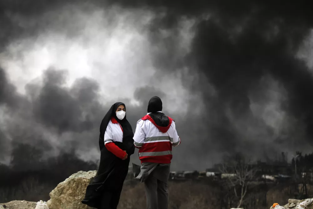 TEHRAN, IRAN - MARCH 8: Black smoke rises after fires broke out following US-Israel attacks targeting some oil storage facilities targeted, including the Shehran oil depot, in Tehran, Iran on March 8, 2026. Explosions and ignited leaking petroleum from the depot caused severe damage to nearby vehicles as intense flames engulfed the area following the strike. Firefighting teams try to control the spreading fires and contain the damage in the heavily affected industrial zone. Fatemeh Bahrami / AnadoluNo Use USA No use UK No use Canada No use France No use Japan No use Italy No use Australia No use Spain No use Belgium No use Korea No use South Africa No use Hong Kong No use New Zealand No use Turkey