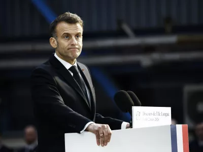 French President Emmanuel Macron delivers a speech next to the submarine 'Le Temeraire' (The Temerarious) at the Nuclear submarines Navy base of Ile Longue in Crozon, France, Monday March 2, 2026. (Yoan Valat/Pool Photo via AP)