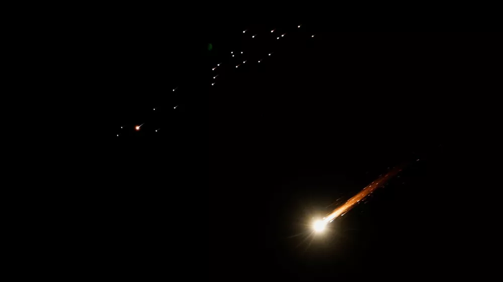 Iranian missiles fly towards Israel, amid the U.S.-Israeli conflict with Iran, as seen from Hebron, in the Israeli-occupied West Bank, March 9, 2026. REUTERS/Mussa Qawasma