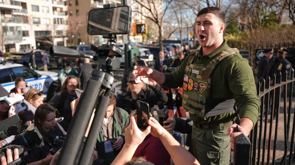 Jake Lang demonstrates outside Gracie Mansion after a news conference by New York Mayor Zohran Mamdani, Monday, March 9, 2026, in New York. (AP Photo/Angelina Katsanis)