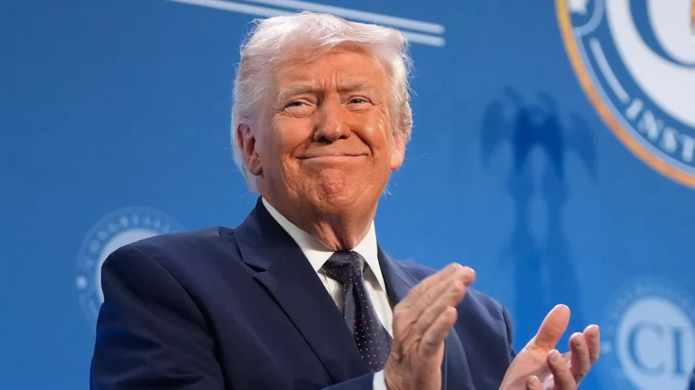 President Donald Trump claps before speaking at the Republican Members Issues Conference, Monday, March 9, 2026, at Trump National Doral Miami in Doral, Fla. (AP Photo/Mark Schiefelbein)
