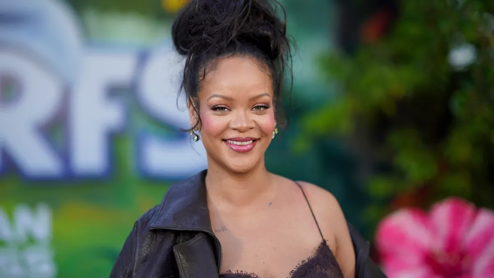 FILE - Rihanna arrives at the premiere of "Smurfs" on Sunday, July 13, 2025, at Paramount Studios in Los Angeles. (Photo by Jordan Strauss/Invision/AP, File)